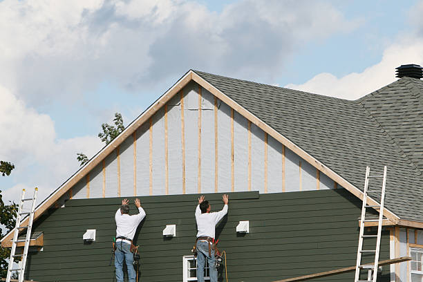 Professional Vinyl Siding technician working in Saint Charles, IL